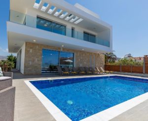 Image of villa exterior with pool