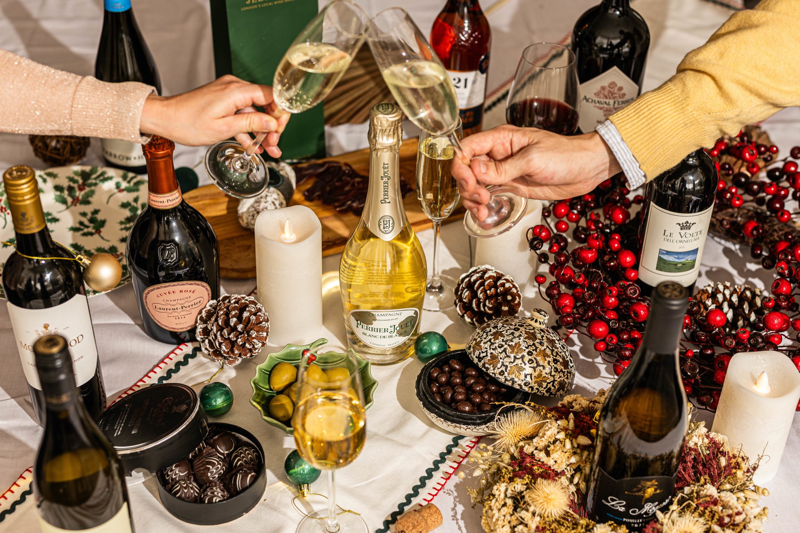 Image of table laid for Christmas and champagne glasses.